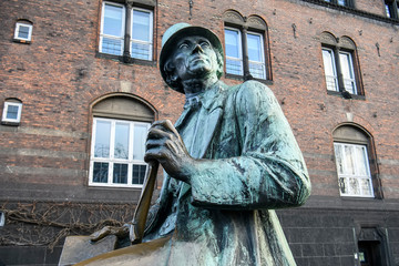 Bronze statue of Hans Christian Andersen at Copenhagen City Hall square, Denmark. February 2020