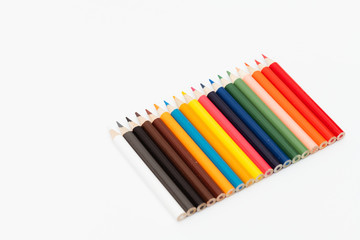 Fototapeta premium Multi color pencils. the concept of a multinational family and equality in the world.