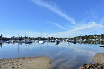 Obraz premium quiet waterside with moored boats