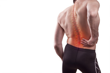 Damage to the lumbar back.  man holds his back in pain.