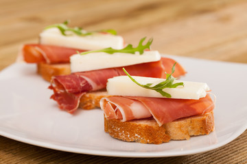 perfect sandwich made with rye bread cheese and Parma ham