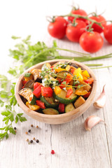 roasted vegetable and rosemary, thyme in bowl