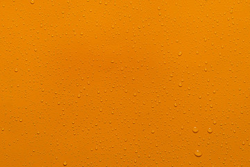 close-up water drop orange background