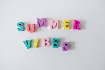 Summer word made of colorful wooden Letters isolated on a White Background