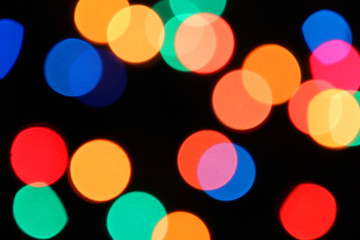 Colored lights spots on a black background