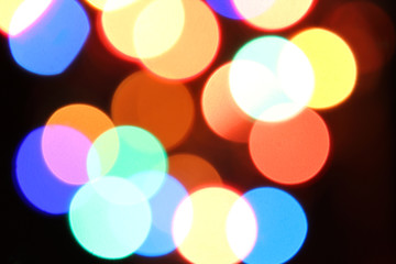 Colored lights spots on a black background