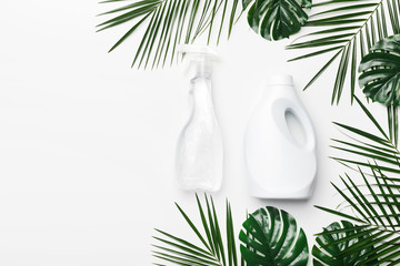 White plastic packaging of laundry detergent and bio spray