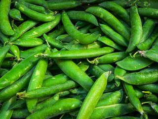 Fresh peas freshly picked for sale in the market