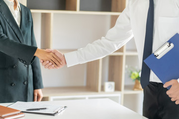 Candidate with resume at job interview with human resource, Recruitment concept..