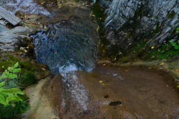 Waterfall from top to bottom.