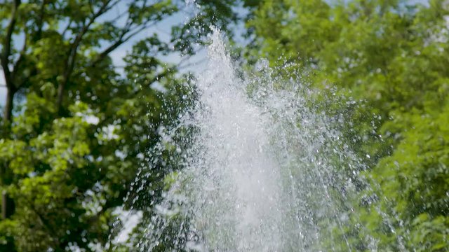 Artesian Fountain In The Park On A Hot Summer Day