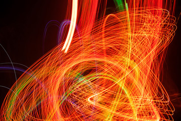Abstract light pattern. Blurred neon lights. A dynamic backdrop for your design. Bright orange