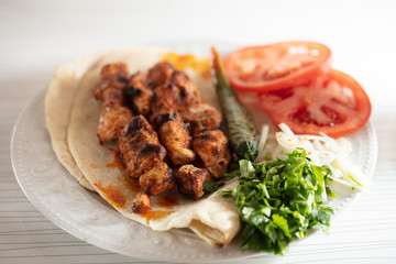 turkish chicken skewers on the lavas bread