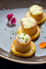 Scallops. Sea Scallops seared in brown butter sauce and garnished with a lemon sauce. 