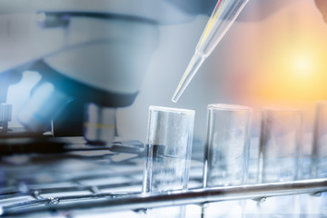 Double exposure test-tube in laboratory.