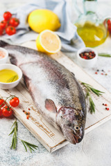 Raw rainbow trout light background