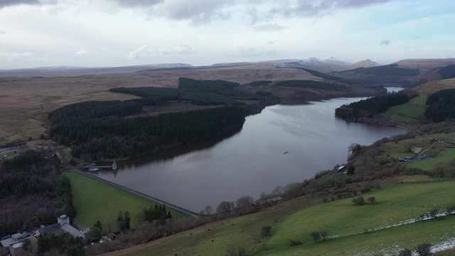 Pontsticill Reservoir on the Taf Fechan river, partly in the county of Powys and partly in the county borough of Merthyr Tydfil, South Wales, UK