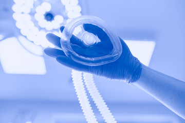 Man surgeon at work in operating room