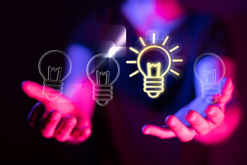 idea lamp concept in hand.