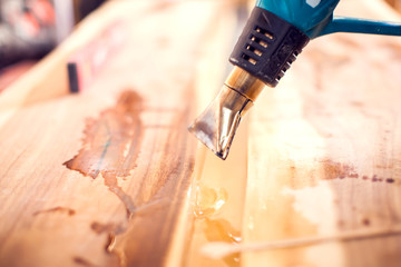 Treatment of wood with epoxy and varnish. Manufacturing of futniture from solid.