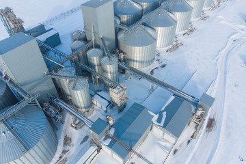 new built cereal elevator photographed from a drone at sunset in the winter