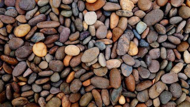 brown stone background. texture of pebbles beach