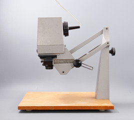 retro device for printing photos on a gray background