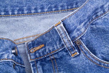 Fototapeta premium Zipper and pockets of jeans as fashion background