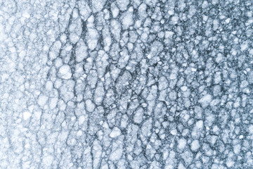 Aerial view on the abstract ice pattern on the surface of the sea.