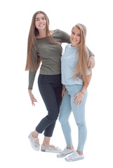in full growth. two happy girlfriends standing together © ASDF
