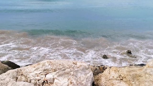 Sea Waves Hitting Stones at a Rock Beach in Lebanon Saida / Sidon City Coastline