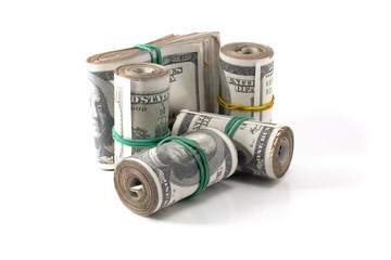 many rolls of money are folded and tied with an elastic band