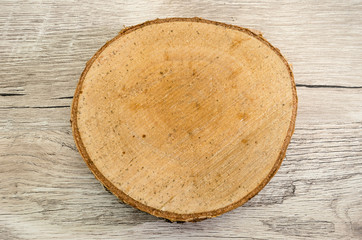 piece of cut wood on the table. Wooden blockhouse. Close-up.