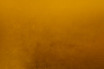 golden grungy background background or texture