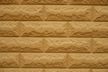 Closeup of yellowish orange common bond brickwork (front view)