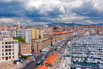 Aerial view of Old Vieux Port on sunny day in the historical city center of Marseilles, France