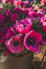 Bouquets of pink anemones on flower street market