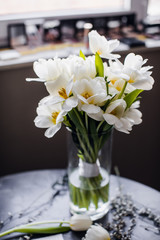 Bouquet of white tulips in vase. International Women's Day. spring flowers