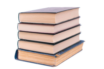 Pile of books in hard covers on a white background, isolate.