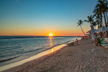 sunset on the beach with kids