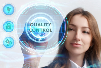 Business, Technology, Internet and network concept. Young businessman working on a virtual screen of the future and sees the inscription: Quality control