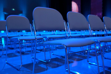 Empty seats waiting for the conference session to start