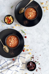 Chocolate smoothie with banana and nuts. Top view with copy space. Protein smoothie.