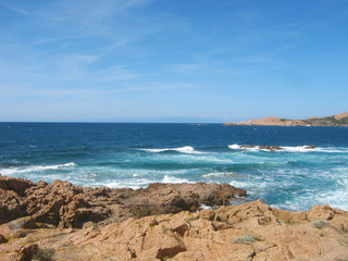 splendid panorama from the valley of the moon in sardinia with its granite rocks and the turquoise sea in the background