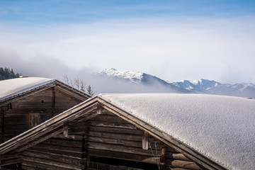 view at a snowcapped mountain with hut