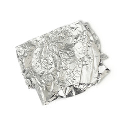 frosted crumpled piece of foil isolated on white background