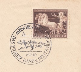 Fototapeta na wymiar Chariot of antiquity. Postmark of Munich stadium Rome. Horse race 