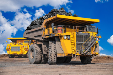 Open pit mine industry, big yellow mining truck for coal anthracite