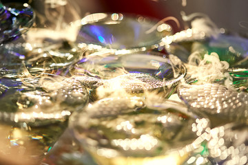 martini glasses in the form of a cascade or pyramid lit light at the wedding party