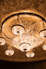 large old chandelier in the theatre. vintage chandelier 